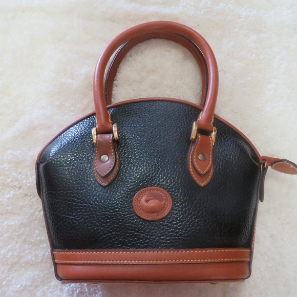 Dooney & Bourke Handbags - Dooney & Bourke Black/Tan Leather Purse